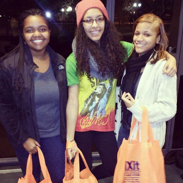 Shoppers at a Style Lottery swap event using reusable bags